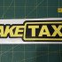 Вінілова наклейка наклейка на автомобіль - Fake TAXI
